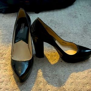 Michael Kors black patent pumps